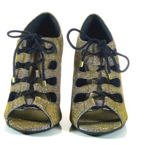 Fioni Night Madem Ghilr gold shimmer open-to sz6.5